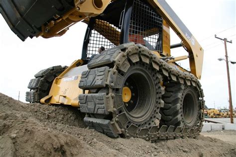 fencing post pounder skid steer tires vs tracks|best tires for skid steer.